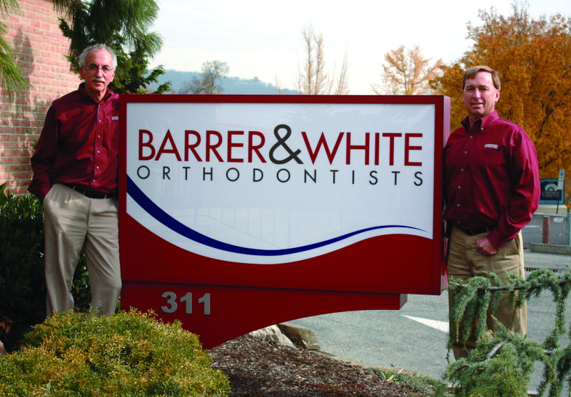 barrer and white orthodontists sign for web.jpg